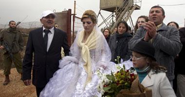 عروس سورية تلتقى زوجها رغم أنف إسرائيل